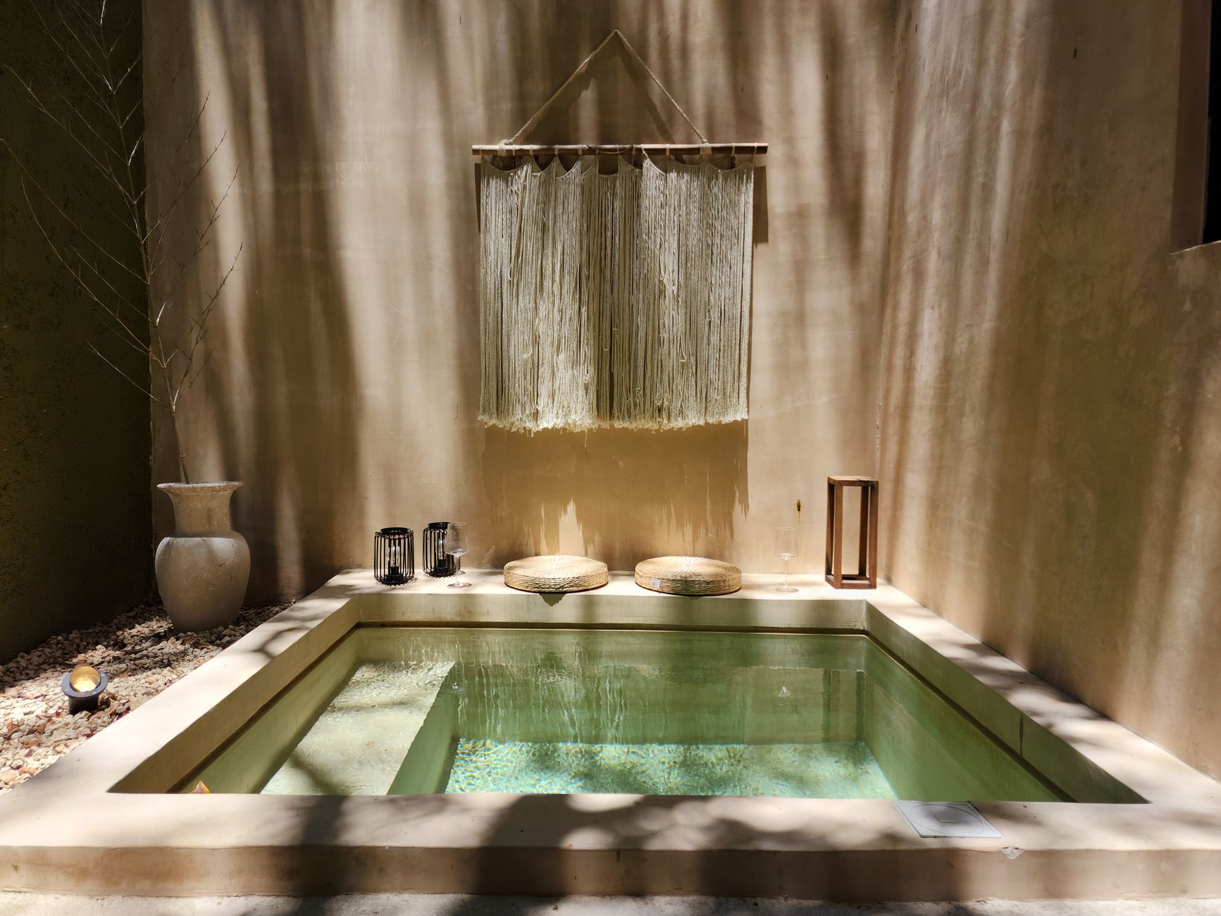 Serene treatment room of a wellness business with natural light and minimal decor